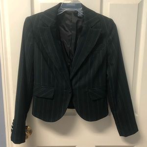 Woman’s Black Blazer, blue pin strip. 3 pockets, 4 button detail at wrist.